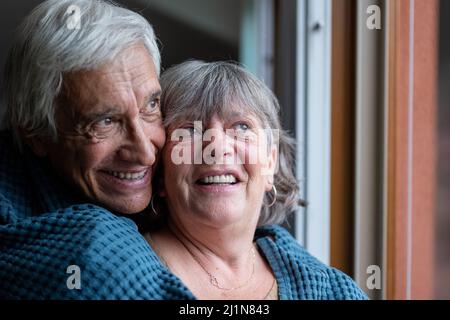 Happy couple in love embracing, middle aged smiling family enjoying tender moment, happy marriage, sincere feelings, enjoy tender moment, showing care Stock Photo