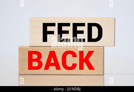 Feed Back Word Written on Wooden Cubes Stock Photo