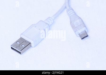 A USB cable for smartphones isolated on a white background Stock Photo