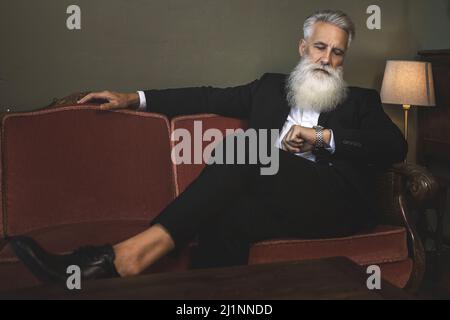 Stylish and handsome bearded senior man Stock Photo