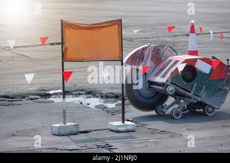 Construction work. Concrete floor cutting machine at the construction site. Stock Photo