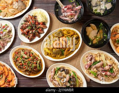 Assorted taiwan food Curry Assorted Fried Noodles, fried noodles with clam rolls, deep-fried Shrimp, fried beef, Fried rolls noodle, Red meat clam sou Stock Photo