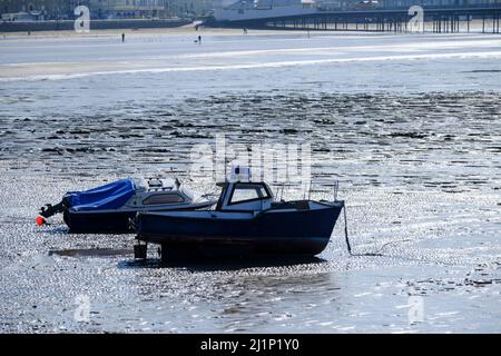 Low tide and low sun at Weston-super-Mare somerset UK Stock Photo