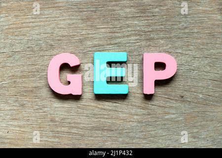 Color alphabet letter in word GEP (abbreviation of good engineering practice) on wood background Stock Photo