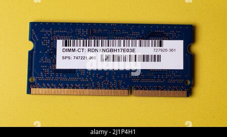 computer laptop memory against a yellow background Stock Photo