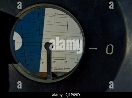 Look through the cycle of a wind rose with a time indicator of CEST (MESZ) on a sun dial Stock Photo