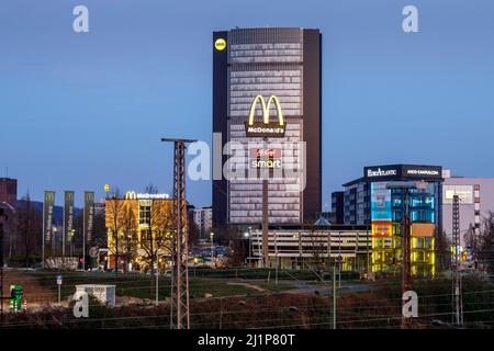 ARAG Versicherungen, head office in Düsseldorf, in the foreground McDonald's Stock Photo