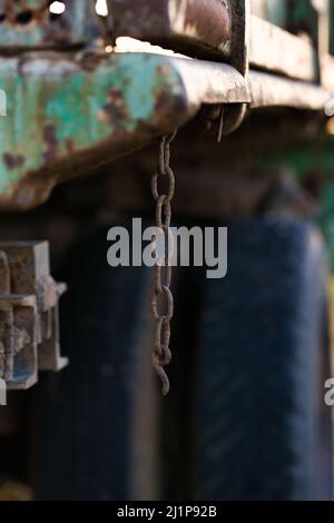 Old Rusted Chain On Tractor Trailer Stock Photo