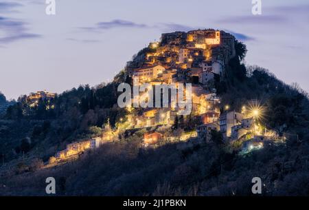 The scenographic village of Rocca Canterano illuminated in the evening, in the Province of Rome, Lazio, central Italy. Stock Photo