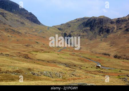 The steep winding road at the Hardknott Pass in the Lake District Stock Photo