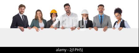 Group of happy multi ethnic architects and business people holding blank banner ad isolated on white background, copy space for text content Stock Photo