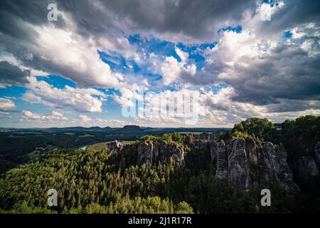Landscape with the rock formations Felsenburg Neurathen and Bastei in Rathen area of the Saxon Switzerland National Park. Stock Photo