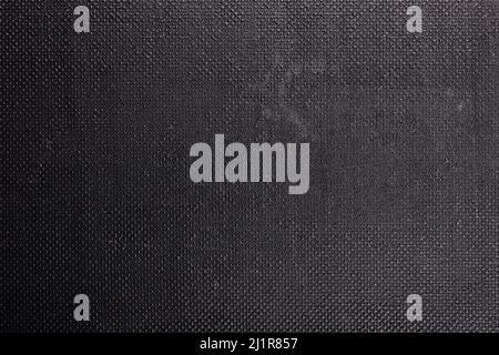 black rough plastic surface with regular artificial pimply bumps Stock Photo