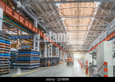 Interior of modern big industrial factory building inside. Stock Photo