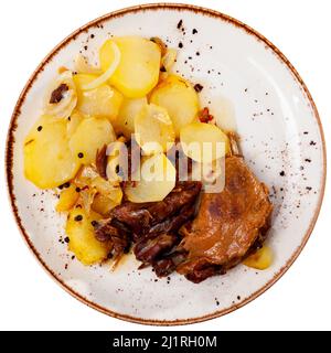 Portion of duck confit on table Stock Photo