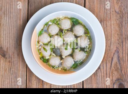 meatball soup bowl, Asian Thai food meat ball and pork balls on wooden background Stock Photo