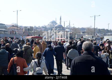 Istanbul, Turkey. 27th Mar, 2022. People walk along the shore of the Bosphorus Strait in Istanbul, Turkey, March 27, 2022. Official statistics from Turkey showed on Wednesday that the country's population is aging at an accelerated rate. According to data released by the Turkish Statistical Institute, the elderly population over the age of 65 has accounted for 9.7 percent of the country's total population. Credit: Shadati/Xinhua/Alamy Live News Stock Photo