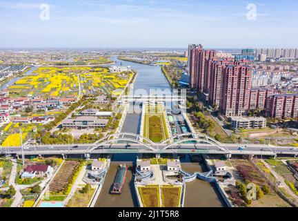 NANTONG, CHINA - MARCH 28, 2022 - Ships pass through Haian Lock in Nantong, East China's Jiangsu Province, March 28, 2022. Stock Photo