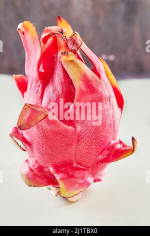 Pitahaya or dragon fruit isolated on white and gray background Stock Photo