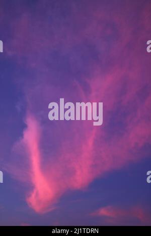Incredible Gradient Purple and Blue Cloudy Sky with Sunset Afterglow Stock Photo