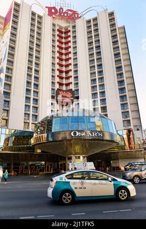 A taxi cab in front of the Plaza Casino on Main street and Fremont, Downtown Las Vegas, Nevada Stock Photo