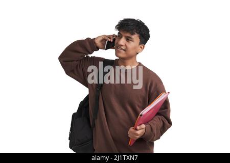 Young peruvian student talking on the smartphone, isolated. Stock Photo