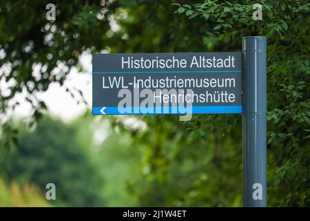 Hattingen, North Rhine-Westphalia, Germany -Hint sign to the historical old town and LWL Industrial Museum Henrichshuette Hattingen, Ruhr promenade wi Stock Photo