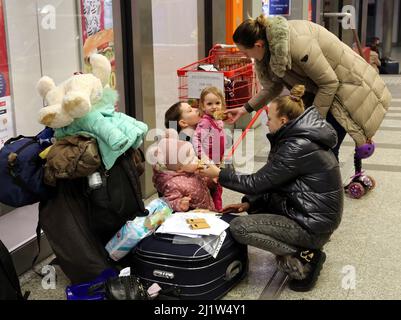 Cracow. Krakow. Poland. Ukrainian refugees, most of them women and children at main railway station. Stock Photo