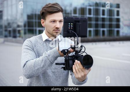 Professional videographer with a modern camera rig Stock Photo