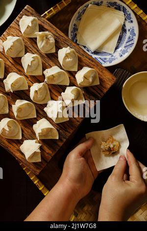 Freshly Made Wontons on Kitchen Countertop Stock Photo