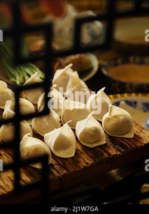 Freshly Made Wontons on Kitchen Countertop Stock Photo