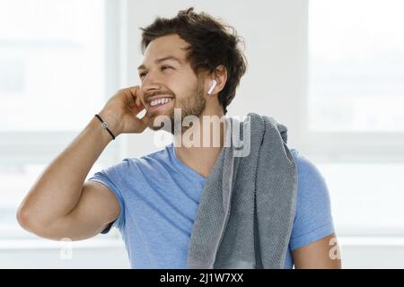 Young and handsome man after fitness workout in the gym Stock Photo