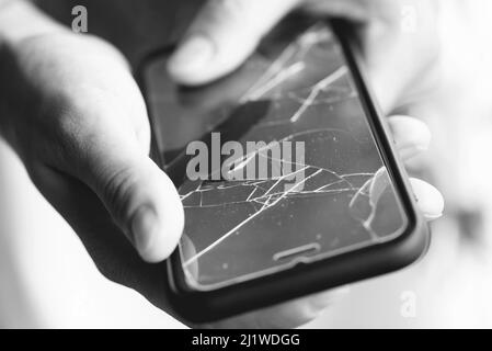 Broken protective film on a smartphone display Stock Photo