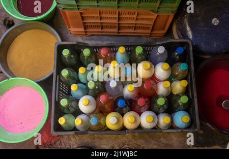 a stall selling Holi paints and dyes at an Indian Market. Photographed in Tiruvannamalai, Tamil Nadu, India Stock Photo
