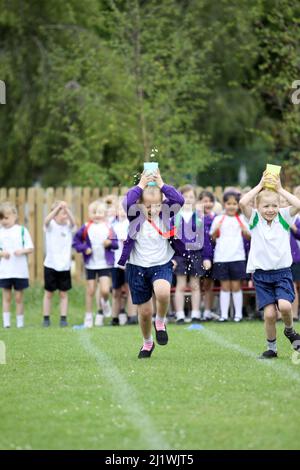 Running races at primary school sportsday Stock Photo