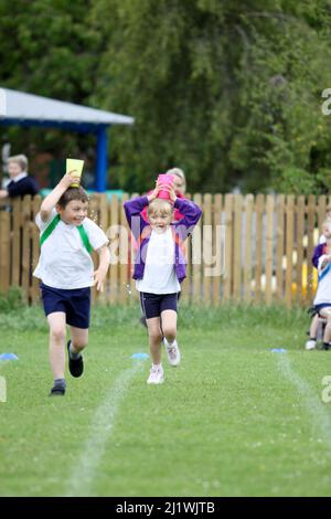 Running races at primary school sportsday Stock Photo