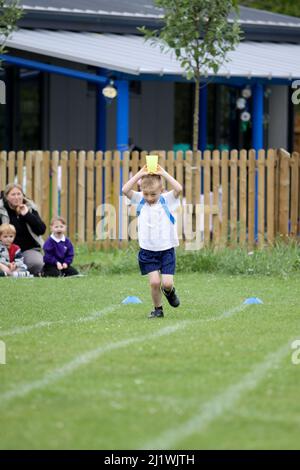 Running races at primary school sportsday Stock Photo