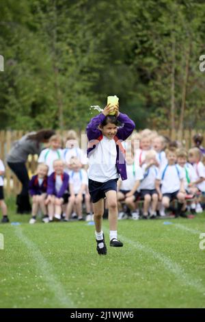 Running races at primary school sportsday Stock Photo