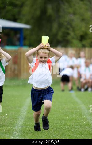 Running races at primary school sportsday Stock Photo