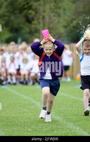 Running races at primary school sportsday Stock Photo