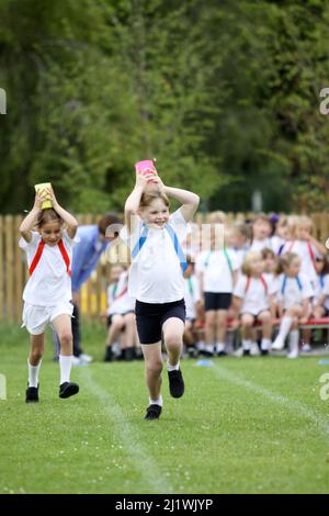 Running races at primary school sportsday Stock Photo