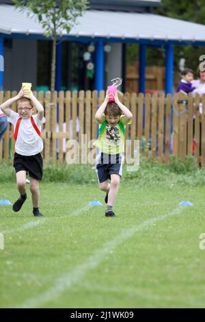 Running races at primary school sportsday Stock Photo