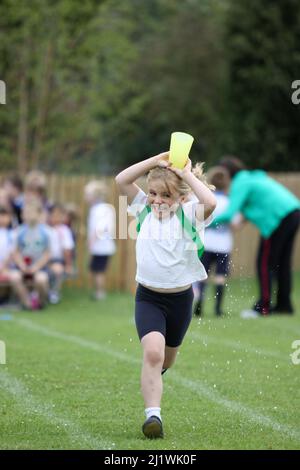 Running races at primary school sportsday Stock Photo