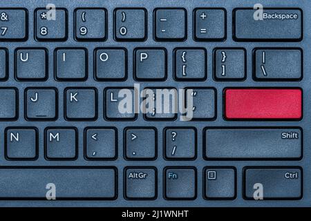 Blank red button on the blue keyboard close-up Stock Photo