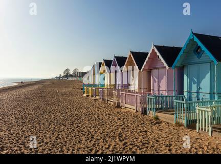 Pastel coloured beach huts, Mersea Island, Essex, UK.