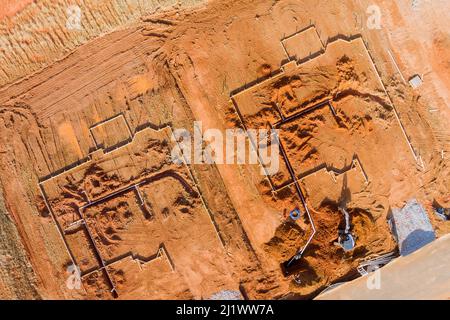 Aerial top layer pipes installation of underground utilities on water drainage system Stock Photo