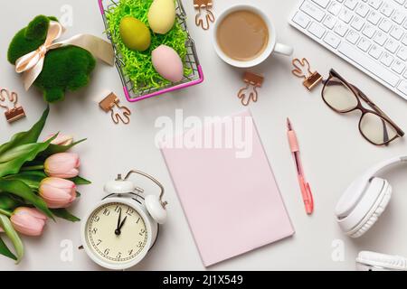 Top view of desktop with easter decorations. Stock Photo