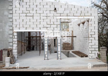 Construction of a country house from gas silicate blocks. Construction site. Real estate sale concept  Stock Photo