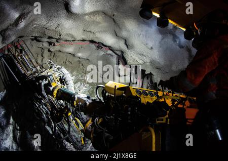 Jumbo Drill Posing at Underground Mine Stock Photo