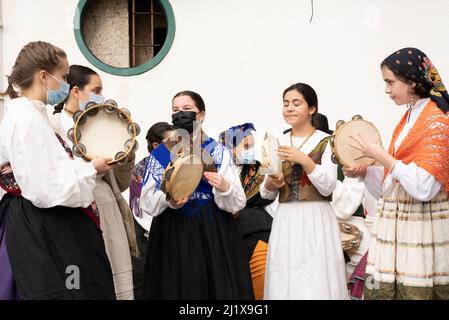 Vigo, Galicia, Spain, March 26 2022: A group of girls play Galician folk music with tambourines in Vigo Spain Stock Photo